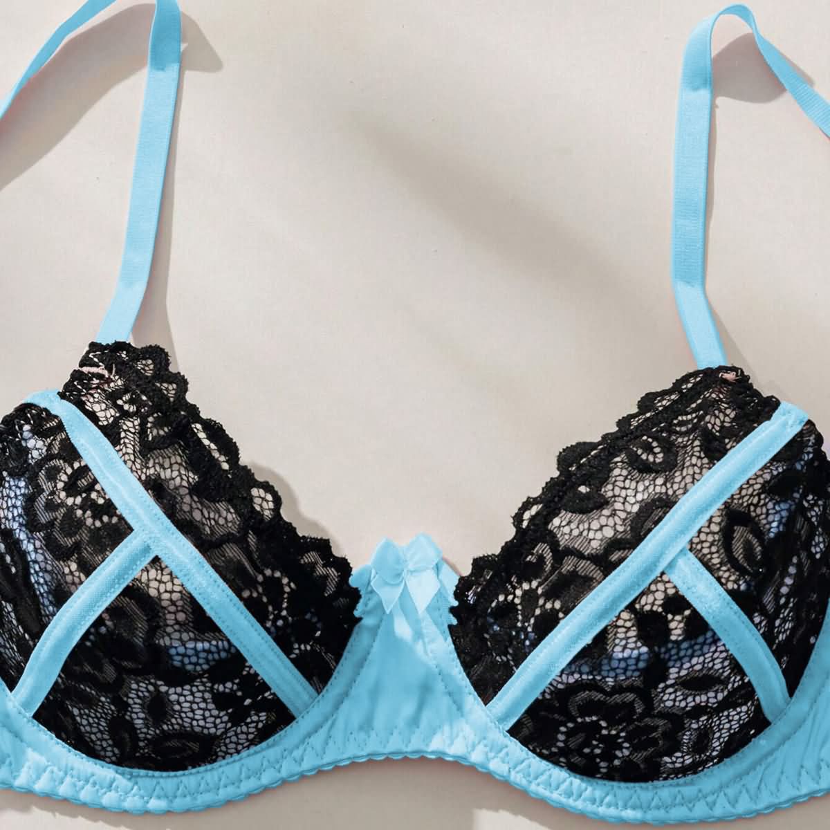 Wonder Skull's Contrast Lace Bra and Panty Set with a playful 'Daddy's Little F Toy' print for a bold and unique touch.