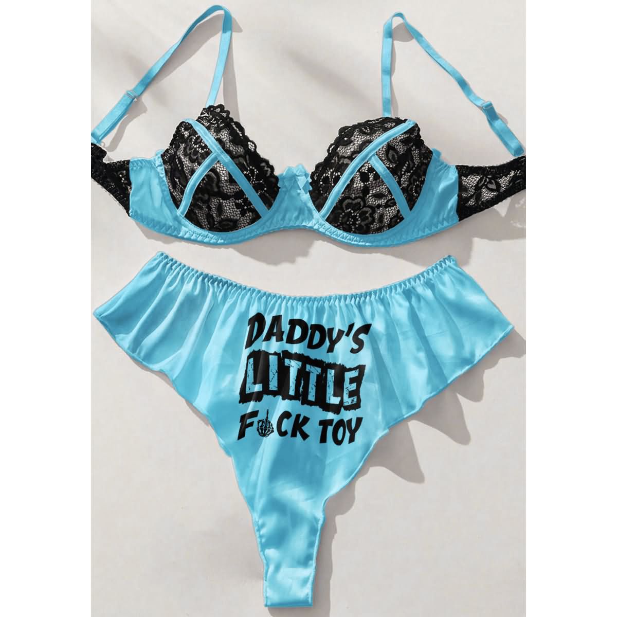 Wonder Skull's Contrast Lace Bra and Panty Set with a playful 'Daddy's Little F Toy' print for a bold and unique touch.