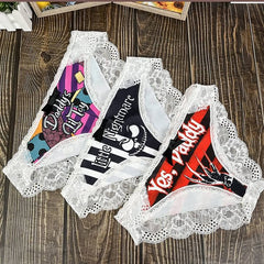 Wonder Skull Sinful Strings Lace Panty Set is for those who love mixing sweet with sassy. The white lace contrasts with bold gothic graphics and cheeky sayings, creating underwear that's both innocent and playful. Designed to make you feel confident and unstoppable, this set is perfect for treating yourself or planning a fun surprise. Comfort and attitude, all in one.