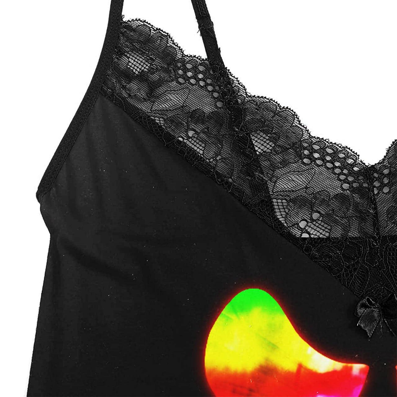 Transform your nighttime routine with the Wonder Skull glow-in-the-dark sleepwear set. The vibrant rainbow skull graphics absorb light by day and glow when darkness falls. Made from a buttery-soft, breathable fabric, this set keeps you cool all night. The delicate, dotted lace trim adds a feminine touch without being scratchy, while adjustable spaghetti straps ensure a perfect fit. This three-piece set includes a matching cami, shorts, and thong, letting you express your bold personality in comfort.