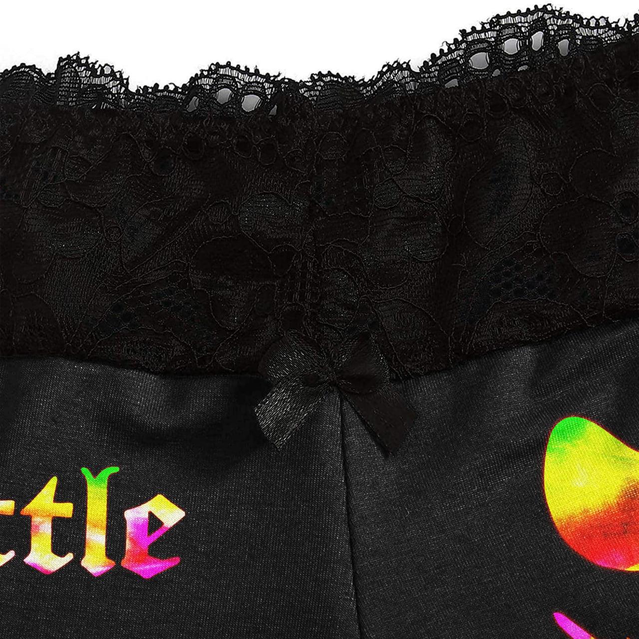 Transform your nighttime routine with the Wonder Skull glow-in-the-dark sleepwear set. The vibrant rainbow skull graphics absorb light by day and glow when darkness falls. Made from a buttery-soft, breathable fabric, this set keeps you cool all night. The delicate, dotted lace trim adds a feminine touch without being scratchy, while adjustable spaghetti straps ensure a perfect fit. This three-piece set includes a matching cami, shorts, and thong, letting you express your bold personality in comfort.