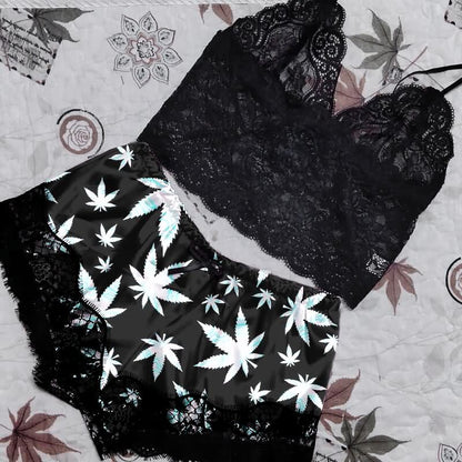 Wonder Skull High Life Lace Trim Pajama Lingerie Sleepwear Shorts Set Upgrade your lounge game with these stylish pajama shorts! Featuring bold leaf prints, flirty lace hems, and a comfortable elastic waistband with adjustable tie, they’re perfect for relaxing or spicing up your evenings. Made with lightweight, breathable fabric and a lace-trimmed back design, these shorts combine comfort, style, and a touch of drama.