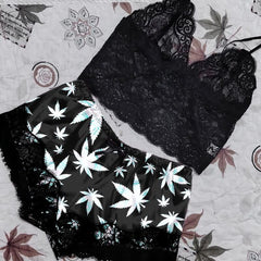 Wonder Skull High Life Lace Trim Pajama Lingerie Sleepwear Shorts Set Upgrade your lounge game with these stylish pajama shorts! Featuring bold leaf prints, flirty lace hems, and a comfortable elastic waistband with adjustable tie, they’re perfect for relaxing or spicing up your evenings. Made with lightweight, breathable fabric and a lace-trimmed back design, these shorts combine comfort, style, and a touch of drama.