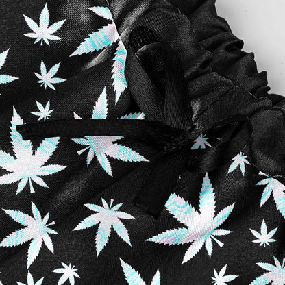 Wonder Skull High Life Lace Trim Pajama Lingerie Sleepwear Shorts Set Upgrade your lounge game with these stylish pajama shorts! Featuring bold leaf prints, flirty lace hems, and a comfortable elastic waistband with adjustable tie, they’re perfect for relaxing or spicing up your evenings. Made with lightweight, breathable fabric and a lace-trimmed back design, these shorts combine comfort, style, and a touch of drama.