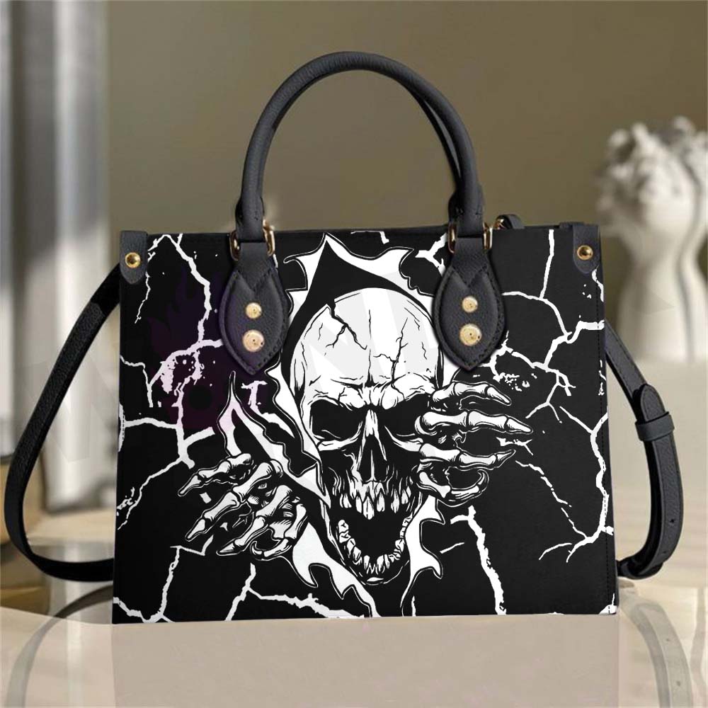 Wonder Skull structured tote bag solves the "I can't find anything in my bag" problem. The aoomy interior fits your tablet, phone, wallet, water bottle, umbrella, and cosmetics — without the overstuffed look. Multiple interior pockets keep everything organized, so you're never digging around at checkout. Reinforced rivet corners and quality metal hardware ensure the bag holds up to daily use. Whether you're heading to work, running errands, or catching a flight, this tote keeps you looking put-together.