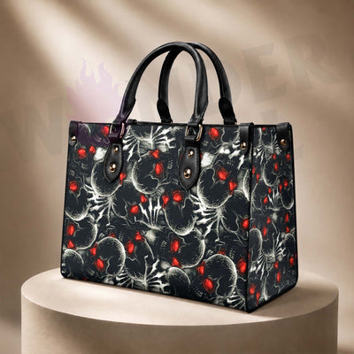 Wonder Skull structured tote bag solves the "I can't find anything in my bag" problem. The aoomy interior fits your tablet, phone, wallet, water bottle, umbrella, and cosmetics — without the overstuffed look. Multiple interior pockets keep everything organized, so you're never digging around at checkout. Reinforced rivet corners and quality metal hardware ensure the bag holds up to daily use. Whether you're heading to work, running errands, or catching a flight, this tote keeps you looking put-together.
