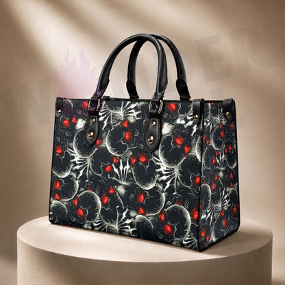 Wonder Skull structured tote bag solves the "I can't find anything in my bag" problem. The aoomy interior fits your tablet, phone, wallet, water bottle, umbrella, and cosmetics — without the overstuffed look. Multiple interior pockets keep everything organized, so you're never digging around at checkout. Reinforced rivet corners and quality metal hardware ensure the bag holds up to daily use. Whether you're heading to work, running errands, or catching a flight, this tote keeps you looking put-together.