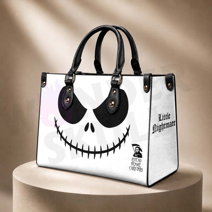 Wonder Skull structured tote bag solves the "I can't find anything in my bag" problem. The aoomy interior fits your tablet, phone, wallet, water bottle, umbrella, and cosmetics — without the overstuffed look. Multiple interior pockets keep everything organized, so you're never digging around at checkout. Reinforced rivet corners and quality metal hardware ensure the bag holds up to daily use. Whether you're heading to work, running errands, or catching a flight, this tote keeps you looking put-together.