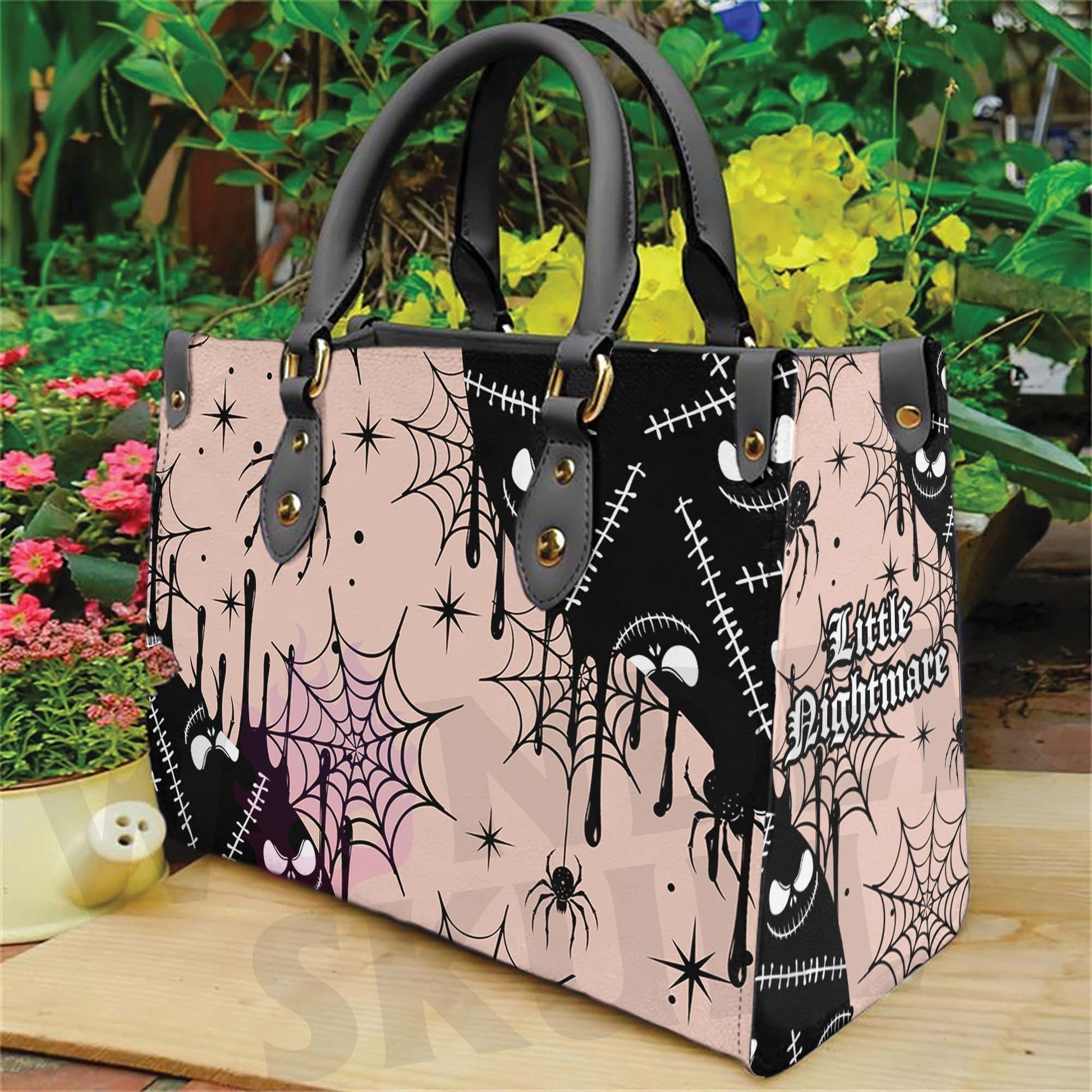 Wonder Skull structured tote bag solves the "I can't find anything in my bag" problem. The roomy interior fits your tablet, phone, wallet, water bottle, umbrella, and cosmetics — without the overstuffed look. Multiple interior pockets keep everything organized, so you're never digging around at checkout. Reinforced rivet corners and quality metal hardware ensure the bag holds up to daily use. Whether you're heading to work, running errands, or catching a flight, this tote keeps you looking put-together.