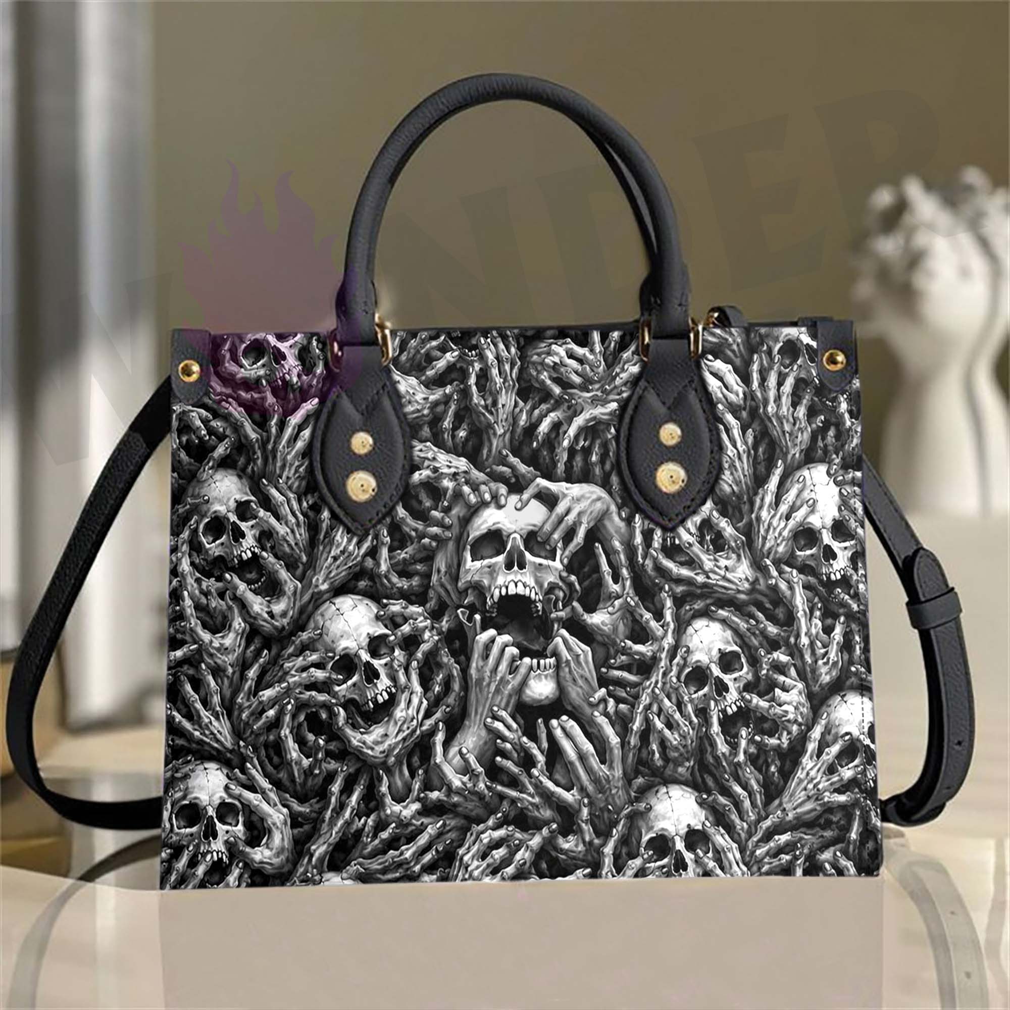 Wonder Skull structured tote bag solves the "I can't find anything in my bag" problem. The aoomy interior fits your tablet, phone, wallet, water bottle, umbrella, and cosmetics — without the overstuffed look. Multiple interior pockets keep everything organized, so you're never digging around at checkout. Reinforced rivet corners and quality metal hardware ensure the bag holds up to daily use. Whether you're heading to work, running errands, or catching a flight, this tote keeps you looking put-together.