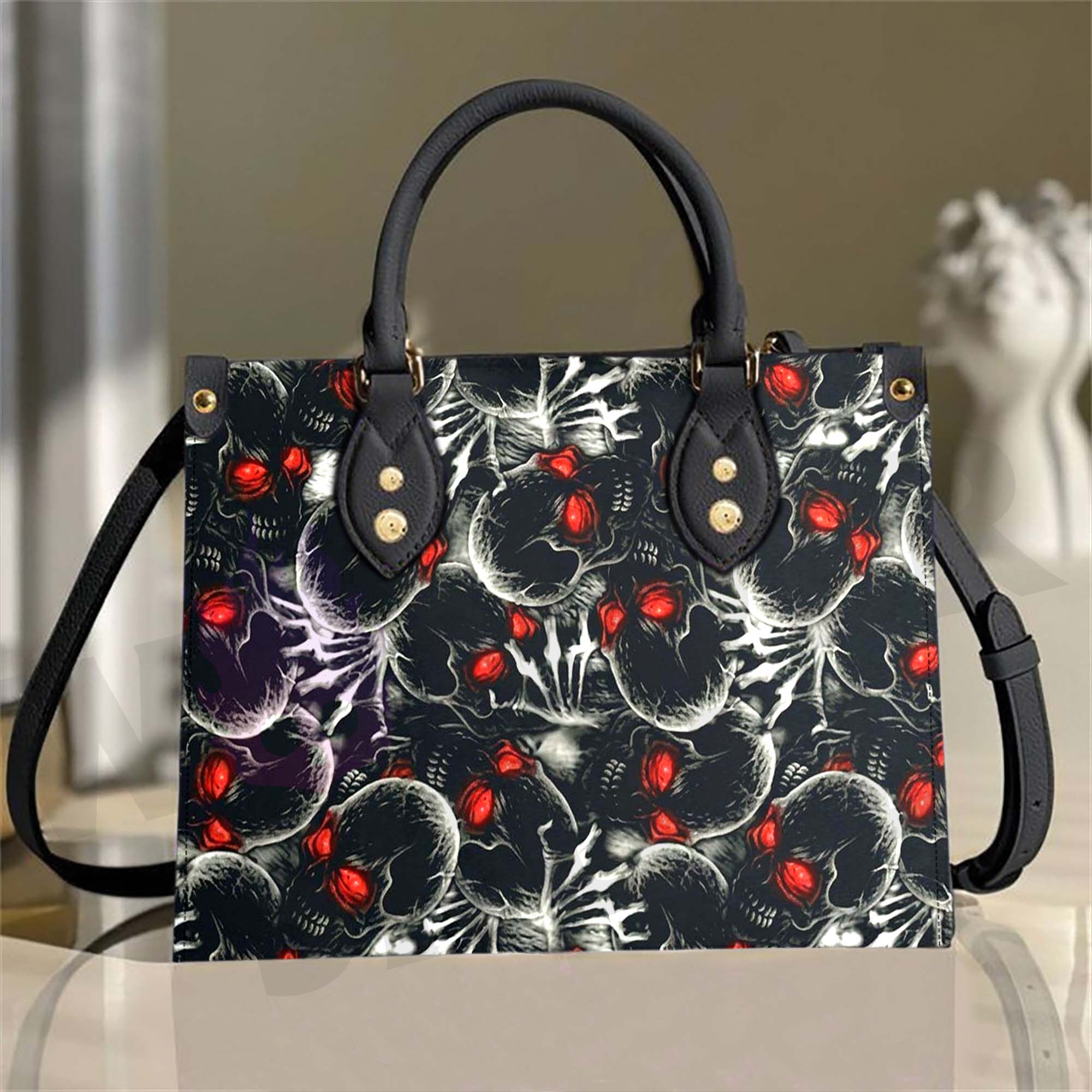 Wonder Skull structured tote bag solves the "I can't find anything in my bag" problem. The aoomy interior fits your tablet, phone, wallet, water bottle, umbrella, and cosmetics — without the overstuffed look. Multiple interior pockets keep everything organized, so you're never digging around at checkout. Reinforced rivet corners and quality metal hardware ensure the bag holds up to daily use. Whether you're heading to work, running errands, or catching a flight, this tote keeps you looking put-together.