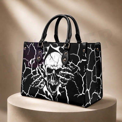 Wonder Skull structured tote bag solves the "I can't find anything in my bag" problem. The aoomy interior fits your tablet, phone, wallet, water bottle, umbrella, and cosmetics — without the overstuffed look. Multiple interior pockets keep everything organized, so you're never digging around at checkout. Reinforced rivet corners and quality metal hardware ensure the bag holds up to daily use. Whether you're heading to work, running errands, or catching a flight, this tote keeps you looking put-together.