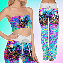 Image featuring a stylish set of women's tube top and high-waisted pants, perfect for summer outings and beachwear. The ensemble exudes a trendy and chic vibe, ideal for resort vacations, beach parties, and poolside lounging. The tube top offers a flattering silhouette, while the high-waisted pants provide comfort and style. This fashionable outfit set is a must-have for anyone looking to make a statement under the sun.