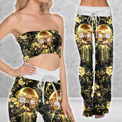 Image featuring a stylish set of women's tube top and high-waisted pants, perfect for summer outings and beachwear. The ensemble exudes a trendy and chic vibe, ideal for resort vacations, beach parties, and poolside lounging. The tube top offers a flattering silhouette, while the high-waisted pants provide comfort and style. This fashionable outfit set is a must-have for anyone looking to make a statement under the sun.