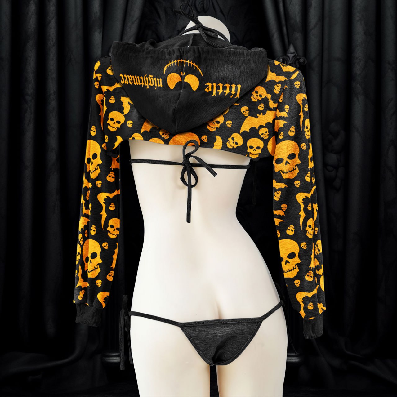 An alluring and seductive lingerie set with a gothic style, featuring intricate details and a unique print that makes it perfect for Halloween or any daring occasion. The set includes a top and bottom, both designed to fit perfectly and enhance the wearer's curves, making her feel confident and empowered.