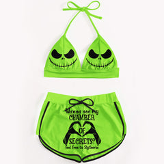  A sexy green two-piece string bikini for women, perfect for making a statement on the beach. The bikini features a halter V-neck, adjustable spaghetti straps, and removable soft padded cups for a flattering fit. Playful quote and Nightmare Before Christmas characters add a unique touch to this swimsuit. Stand out and have fun in this one-of-a-kind bathing suit.
