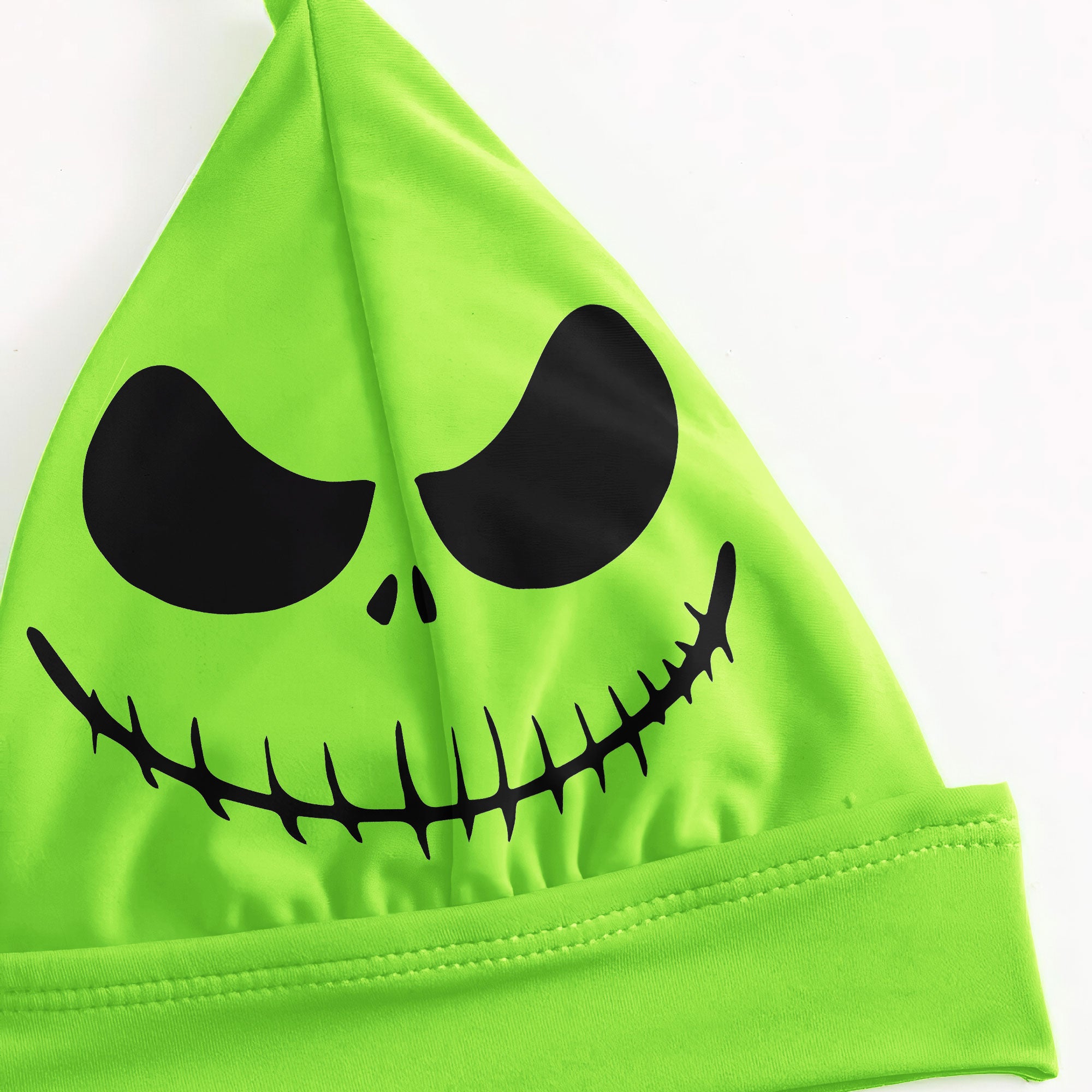  A sexy green two-piece string bikini for women, perfect for making a statement on the beach. The bikini features a halter V-neck, adjustable spaghetti straps, and removable soft padded cups for a flattering fit. Playful quote and Nightmare Before Christmas characters add a unique touch to this swimsuit. Stand out and have fun in this one-of-a-kind bathing suit.