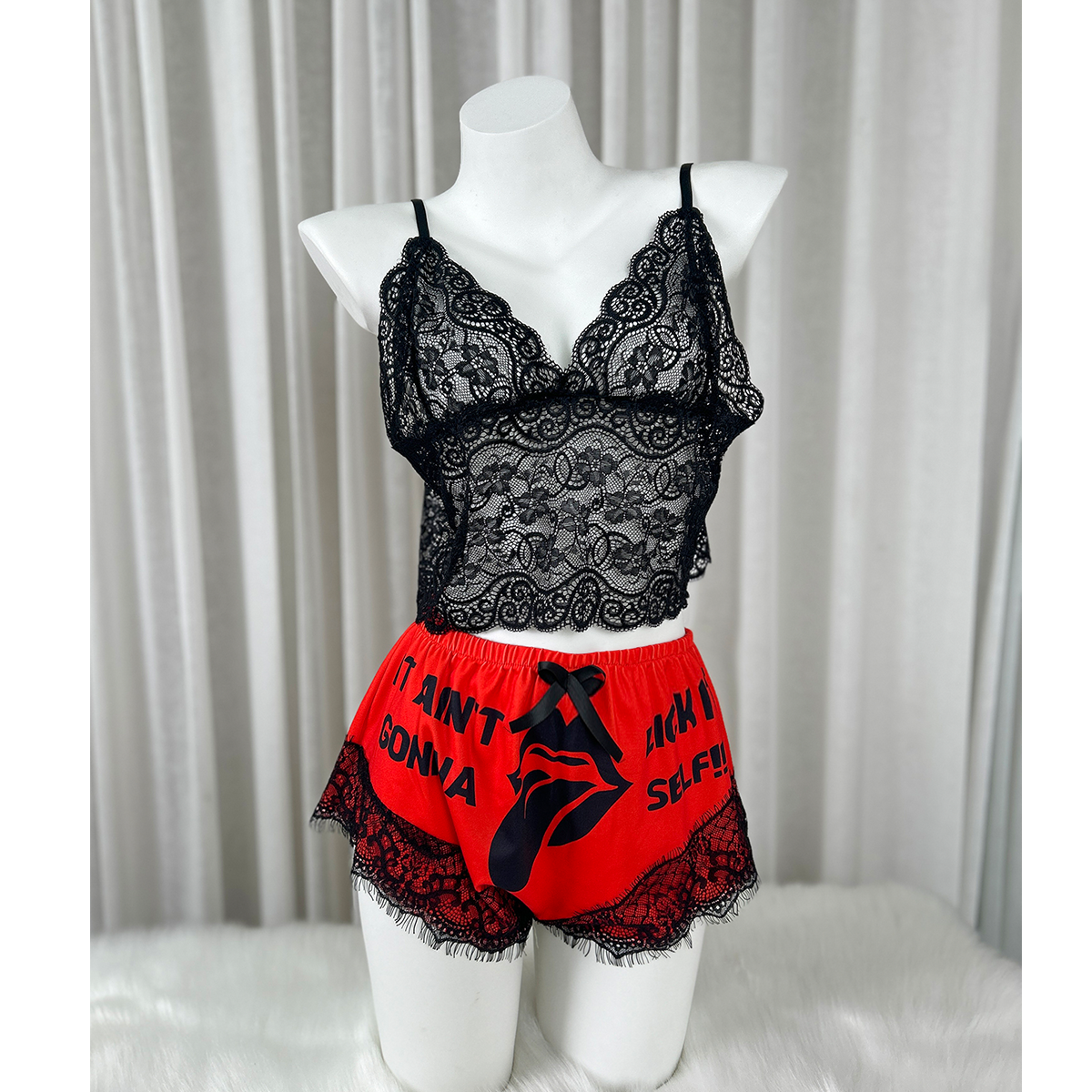 Get ready to turn up the heat with Wonder Skull Women's Lace Pajama Set, Funny Print Lingerie Sleepwear - Spicy & Sassy Red Lace Lingerie Set. Featuring an eye-catching "Lick It" print and a flirty lace trim, this set is perfect for those who love to add a touch of bold humor to their nightwear. Whether you’re lounging at home or feeling playful, this funny lingerie set is bound to make you feel confident and comfortable!
