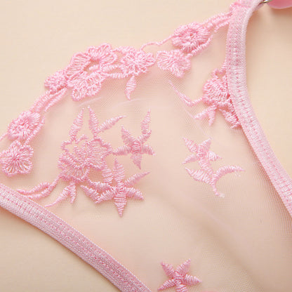 Ignite passion with our Women's Sexy Lingerie Set featuring a cute lace design, garter belt, and matching thongs. The 4-piece ensemble, including fishnet mesh, satin rave outfits, and velvet sleepwear sets, offers options to suit your mood. Enjoy a perfect fit with adjustable straps and closures for personalized comfort. Ideal for romantic nights, honeymoons, birthdays, or as a thoughtful gift for special occasions.