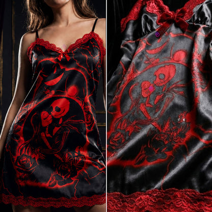 Experience better sleep with the Wonder Skull Chemise Nightgown. Its buttery-soft satin feels amazing, while red lace panels at the neckline, sides, and hem keep you cool all night. The adjustable straps and flowing A-line silhouette allow for a comfortable, non-restrictive fit. Bold red crackle skeleton artwork is balanced by sweet satin bows, adding a feminine touch. 
