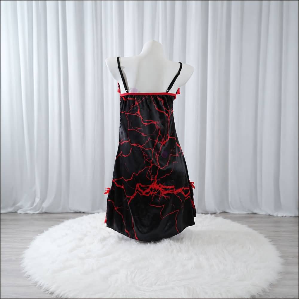 Experience better sleep with the Wonder Skull Chemise Nightgown. Its buttery-soft satin feels amazing, while red lace panels at the neckline, sides, and hem keep you cool all night. The adjustable straps and flowing A-line silhouette allow for a comfortable, non-restrictive fit. Bold red crackle skeleton artwork is balanced by sweet satin bows, adding a feminine touch. 