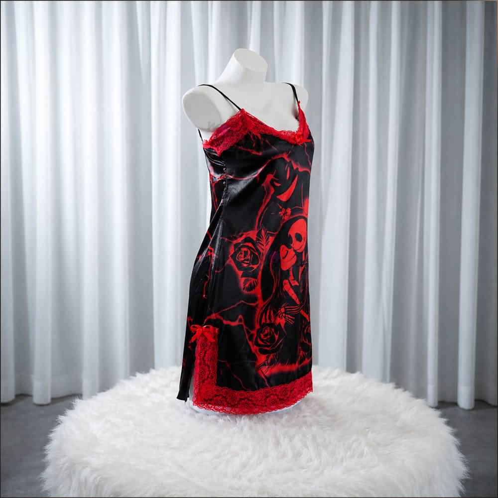 Experience better sleep with the Wonder Skull Chemise Nightgown. Its buttery-soft satin feels amazing, while red lace panels at the neckline, sides, and hem keep you cool all night. The adjustable straps and flowing A-line silhouette allow for a comfortable, non-restrictive fit. Bold red crackle skeleton artwork is balanced by sweet satin bows, adding a feminine touch. 