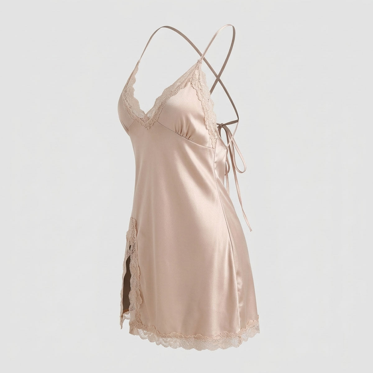 Transform your nighttime routine with the Wonder Skull champagne satin slip dress. Its buttery-soft fabric feels amazing, while the adjustable criss-cross tie back ensures a perfect fit. Delicate, non-scratchy lace adds a romantic touch to the V-neckline and hem. Made from lightweight satin, this dress keeps you cool and comfortable all night long. Feel effortlessly beautiful without sacrificing comfort.
