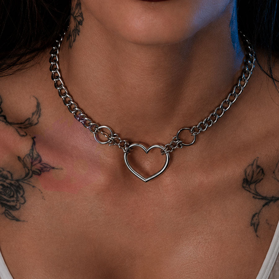 Wonder Skull Heart Ring Day Collar Discreet Stainless Steel Sub Necklace - A seamless heart-ring day collar in waterproof stainless steel — 24/7 wearable, discreetly symbolic, and with an optional lock that holds your bond tighter than the bond of lips.