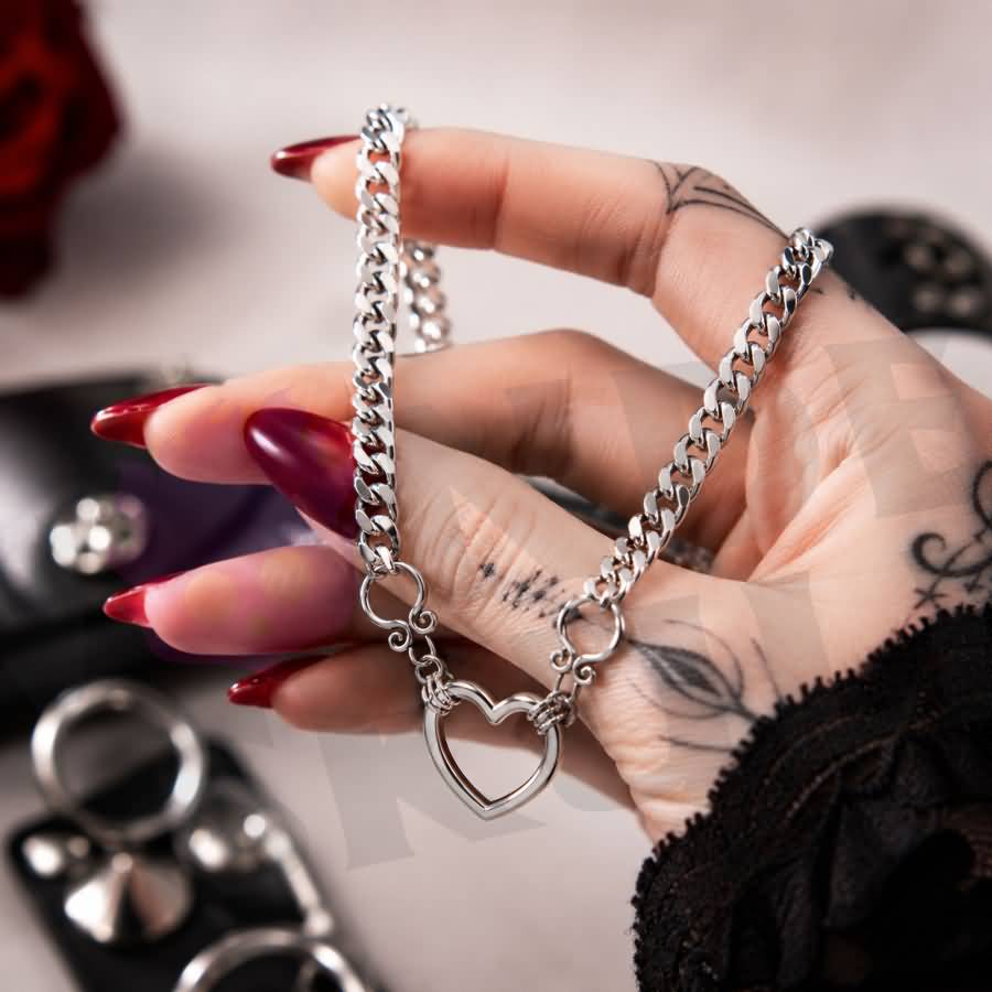 Wonder Skull Heart Ring Day Collar Discreet Stainless Steel Sub Necklace - A seamless heart-ring day collar in waterproof stainless steel — 24/7 wearable, discreetly symbolic, and with an optional lock that holds your bond tighter than the bond of lips.