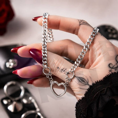 Wonder Skull Heart Ring Day Collar Discreet Stainless Steel Sub Necklace - A seamless heart-ring day collar in waterproof stainless steel — 24/7 wearable, discreetly symbolic, and with an optional lock that holds your bond tighter than the bond of lips.