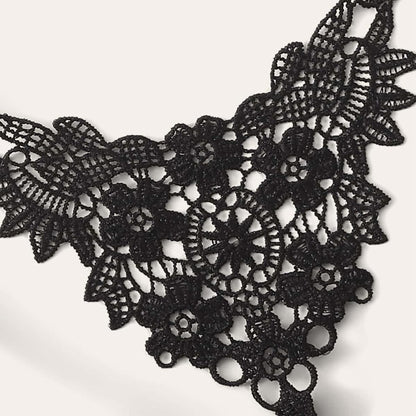 Wonder Skull High on Desire Lace Lingerie Set features a bold leaf print, sheer floral lace, and a strappy racerback with a front-clip clasp for style and convenience. Made from breathable, lightweight fabric, it offers comfort and elegance, perfect for showcasing confidence. Shop now to elevate your lingerie collection!