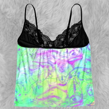 Add a little mischief to your bedtime routine with the Wonder Skull Lace 3-Piece Sleepwear Set. This set includes a lace-trim camisole, matching shorts, and a coordinating thong in a bold green-and-purple graphic print. Delicate black lace adds a feminine touch, while the playful design keeps you feeling comfortable and confident after dark.