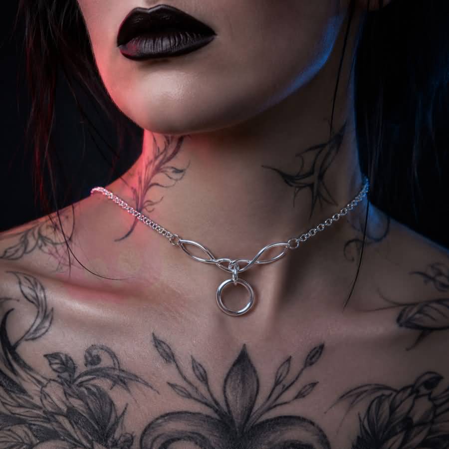 Wonder Skull A dainty stainless steel cable chain leads into an elegant Celtic-style twist link cradling a single polished O-ring — the timeless symbol of D/s devotion. Light, waterproof, and tarnish-resistant, it's built for true 24/7 wear yet discreet enough to pass as everyday jewelry. Unmistakable to the one who knows, invisible to everyone else.