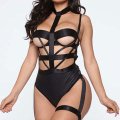 Wonder Skull Obsidian Straps Bondage Bodysuit Lingerie Sleepwear Set combines daring satin straps, a seductive open cup design, and flattering high-cut details to accentuate your curves. Featuring edgy leg harness accents, it’s perfect for making a statement and empowering your confidence. Feel sexy, unstoppable, and ready to own the moment.