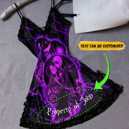 Wonder Skull black satin slip nightgown features bold purple skeleton artwork to liven up your bedtime routine. Buttery-soft satin glides against your skin, with delicate black lace trimming the neckline and hem. Adjustable spaghetti straps ensure a perfect fit, while the flowing A-line silhouette flatters your figure. The purple skeleton couple surrounded by roses makes a bold romantic statement, so you can feel beautifully yourself in your most private moments.