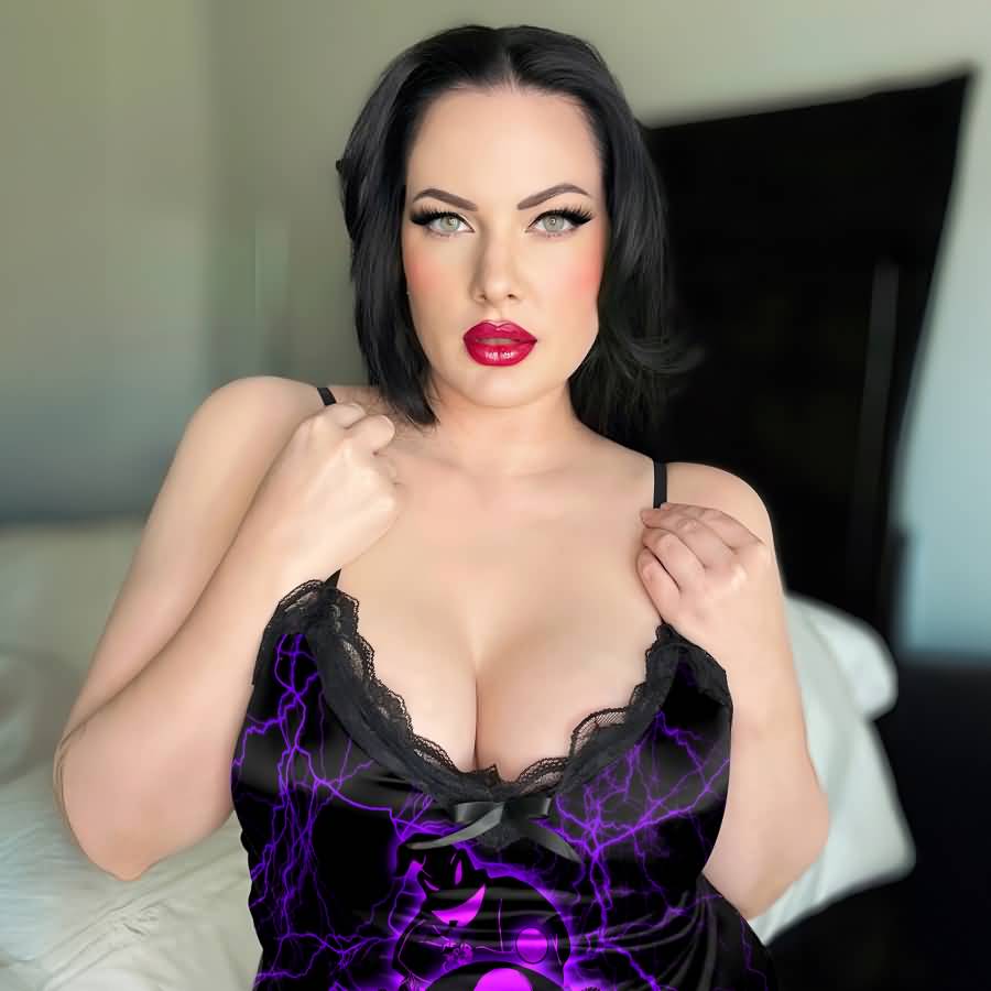 Wonder Skull black satin slip nightgown features bold purple skeleton artwork to liven up your bedtime routine. Buttery-soft satin glides against your skin, with delicate black lace trimming the neckline and hem. Adjustable spaghetti straps ensure a perfect fit, while the flowing A-line silhouette flatters your figure. The purple skeleton couple surrounded by roses makes a bold romantic statement, so you can feel beautifully yourself in your most private moments.