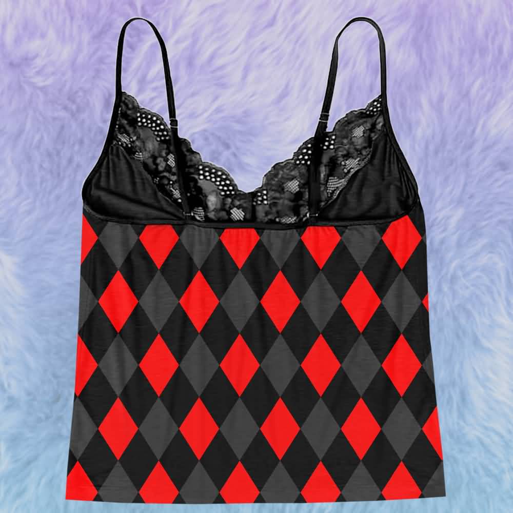 Upgrade your sleepwear with the Wonder Skull Cami Pajama Set. Crafted from silky, breathable fabric, this set keeps you cool and comfortable all night. The soft lace trim adds a feminine touch without irritation, while adjustable spaghetti straps ensure a perfect, custom fit. Finished with a bold graphic print, it’s the perfect blend of personality and comfort for lounging or sleeping.