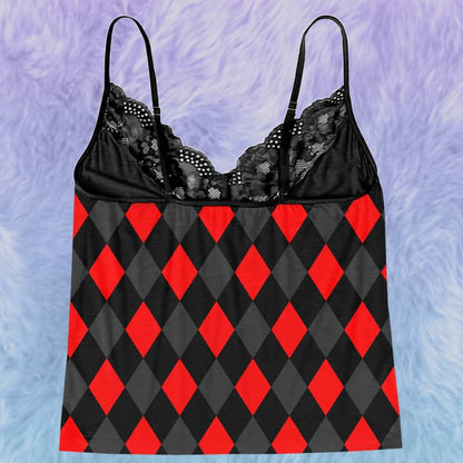 Upgrade your sleepwear with the Wonder Skull Cami Pajama Set. Crafted from silky, breathable fabric, this set keeps you cool and comfortable all night. The soft lace trim adds a feminine touch without irritation, while adjustable spaghetti straps ensure a perfect, custom fit. Finished with a bold graphic print, it’s the perfect blend of personality and comfort for lounging or sleeping.