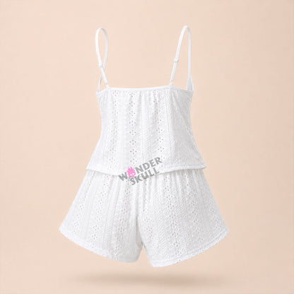 Stay cool and comfortable all night with the Wonder Skull Pajama Set. The breathable, embroidered fabric allows for constant airflow to prevent overheating, while the soft, scalloped lace trim adds a romantic detail without irritation. Customize your fit with the adjustable tie-front closure and a comfortable elastic waistband. The lightweight fabric helps you sleep peacefully and wake up refreshed.