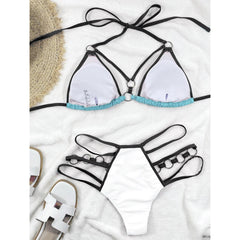 Wonder Skull Women's Bikini is a stylish two-piece with a cheeky cut-out design, stitched accents, and oversized rings. Made with soft, elastic fabric and adjustable straps, it offers a comfortable, flattering fit for all body types—perfect for relaxation or making memories by the water.