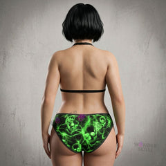 Make a statement with the Wonder Skull Women's Bikini, a bold green skull one-piece featuring lightning accents. Designed with breathable, stretch fabric and adjustable straps, it offers style, comfort, and a secure fit for all-day wear. Perfect for the beach or pool!
