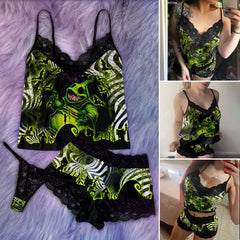 Wonder Skull Women's Lace Pajama Set is expertly designed to conform to your body's shape, providing a flawless fit with every wear. Crafted with stretchy and flattering materials, it embraces all body types, ensuring a silhouette that looks great on anyone. Wake up feeling refreshed and self-assured in this standout 3-piece outfit, featuring the Nightmare Boo Unique Print that combines trendy colors with retro vibes for a unique addition to your sleepwear collection.