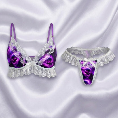 Wonder Skull Women's Lingerie, Ruffle Skull Purple Lace Bra Pant Sleepwear Set combines attitude and style with features like a purple skull print, intricate white lace trim, and playful ruffle details. Designed for comfort and confidence, the set includes adjustable straps for a perfect fit, making it ideal for any day you want to express your unique flair.
