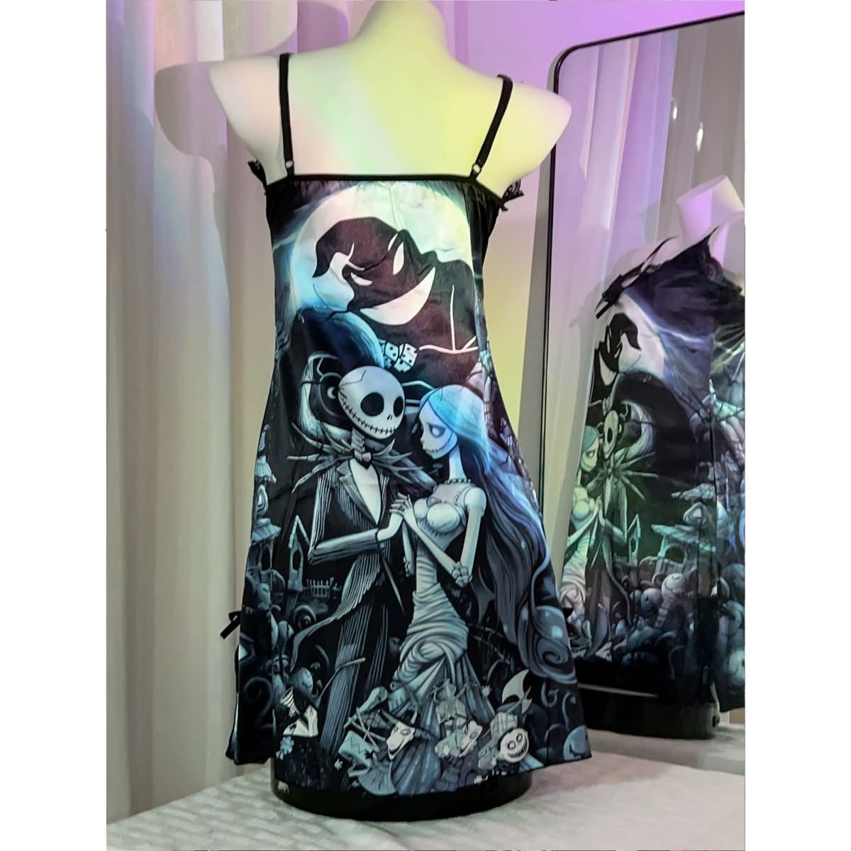 Wonder Skull Women's Nightgown, Dark Nightmare Comfort Adjustable Straps Babydoll Chemise Sleepwear that combines dark romance with comfort and style. Inspired by "The Nightmare Before Christmas," this nightdress features unique patterns, premium fabrics, and adjustable straps for a perfect fit. Ideal for themed parties or lounging at home, it offers durability and easy care, maintaining its enchanting design wash after wash.