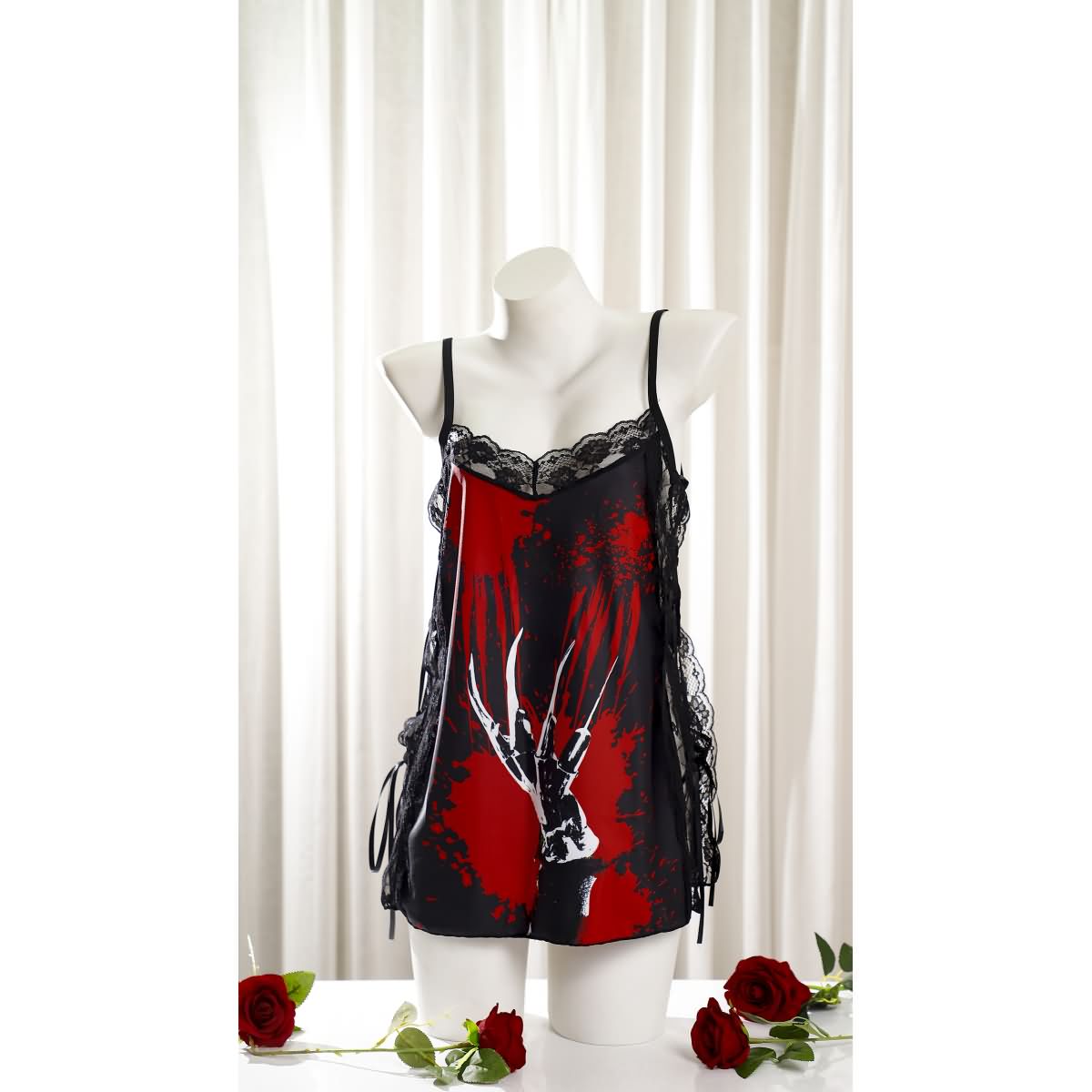 Wonder Skull Women's Nightgown combines comfort, style, and spooky charm with silky fabric, soft lace, adjustable straps, and glow-in-the-dark accents. Perfect for lounging, sleepwear, or gifting, it's a must-have for fans of gothic fashion and special occasions like Halloween or anniversaries.