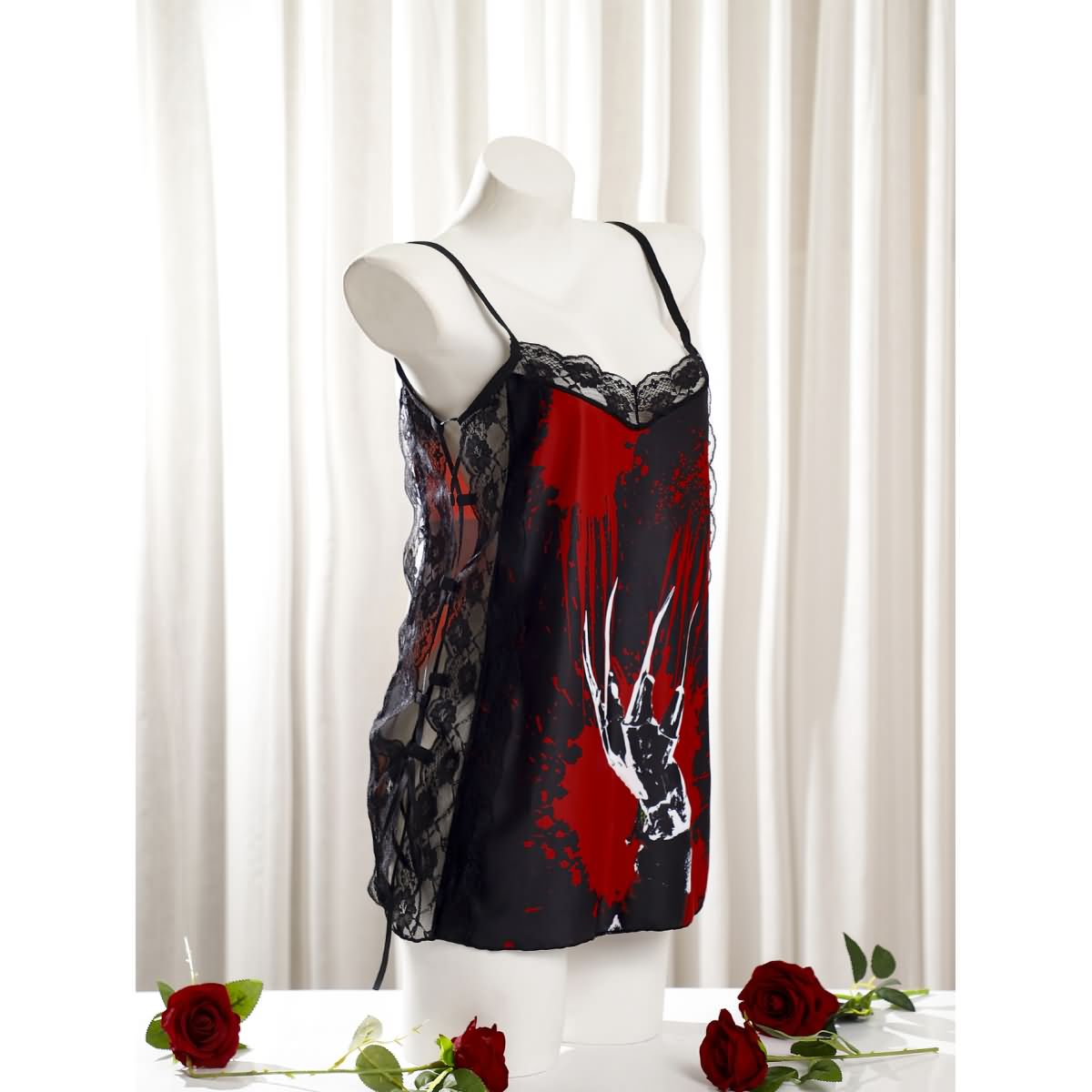 Wonder Skull Women's Nightgown combines comfort, style, and spooky charm with silky fabric, soft lace, adjustable straps, and glow-in-the-dark accents. Perfect for lounging, sleepwear, or gifting, it's a must-have for fans of gothic fashion and special occasions like Halloween or anniversaries.