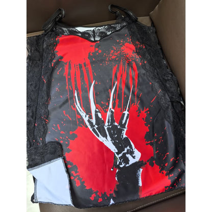 Wonder Skull Women's Nightgown combines comfort, style, and spooky charm with silky fabric, soft lace, adjustable straps, and glow-in-the-dark accents. Perfect for lounging, sleepwear, or gifting, it's a must-have for fans of gothic fashion and special occasions like Halloween or anniversaries.