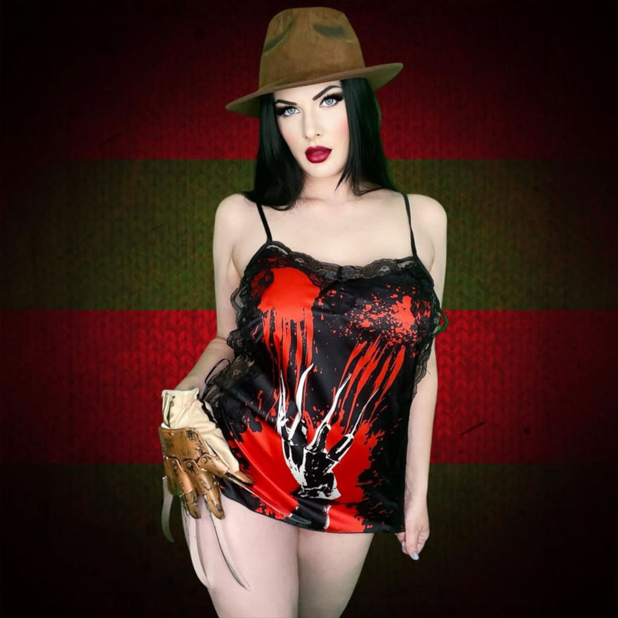 Wonder Skull Women's Nightgown combines comfort, style, and spooky charm with silky fabric, soft lace, adjustable straps, and glow-in-the-dark accents. Perfect for lounging, sleepwear, or gifting, it's a must-have for fans of gothic fashion and special occasions like Halloween or anniversaries.
