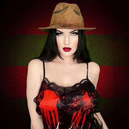 Wonder Skull Women's Nightgown combines comfort, style, and spooky charm with silky fabric, soft lace, adjustable straps, and glow-in-the-dark accents. Perfect for lounging, sleepwear, or gifting, it's a must-have for fans of gothic fashion and special occasions like Halloween or anniversaries.
