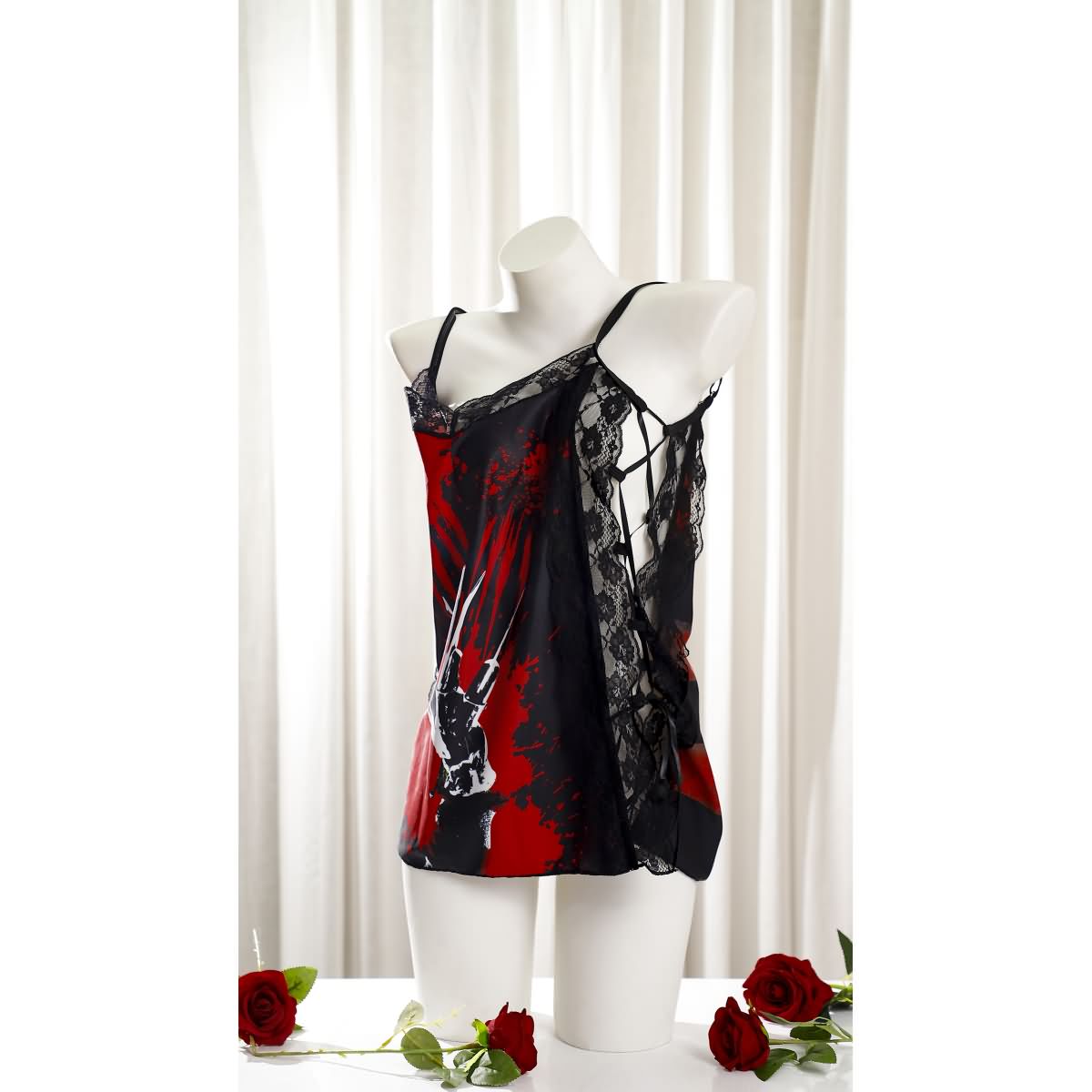 Wonder Skull Women's Nightgown combines comfort, style, and spooky charm with silky fabric, soft lace, adjustable straps, and glow-in-the-dark accents. Perfect for lounging, sleepwear, or gifting, it's a must-have for fans of gothic fashion and special occasions like Halloween or anniversaries.